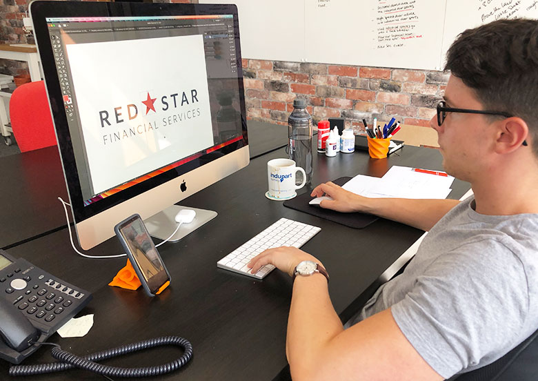 Luke working on red star logo