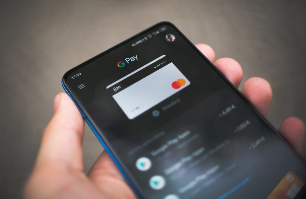 eCommerce Payment Gateway, GooglePay shown on phone