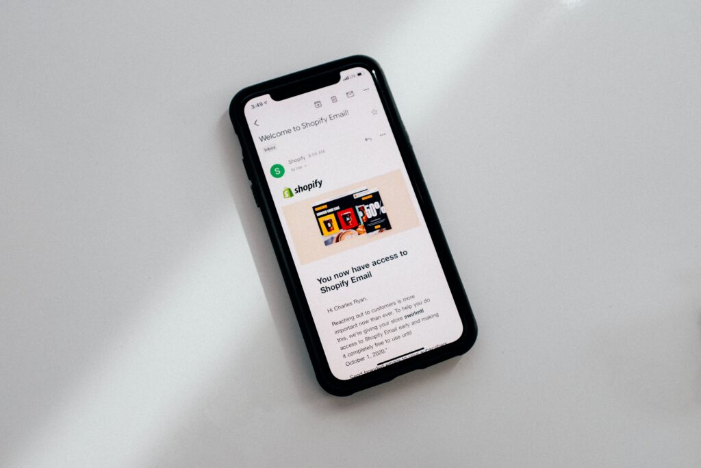Welcome to Shopify email displayed on a smartphone