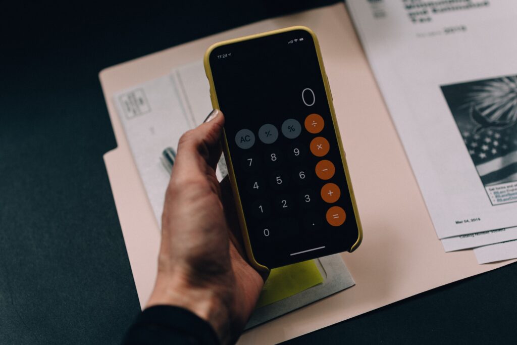 Weighting up whether Headless Commerce is afforable on an iPhone calculator 