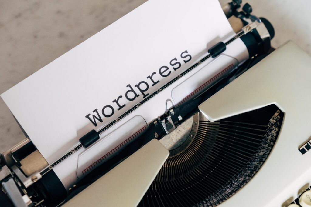 the word 'Wordpress' typed out on a typewriter