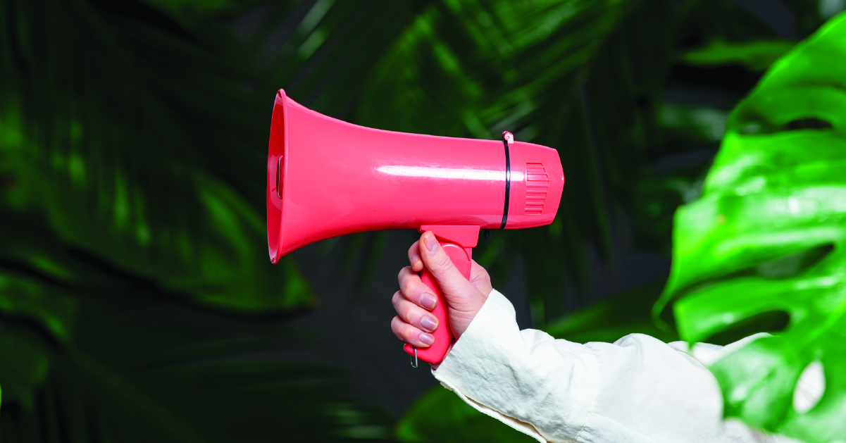 eCommerce Marketing Tips to Acquire, Convert and Retain Customers - Blog Header Image showing a man holding a megaphone