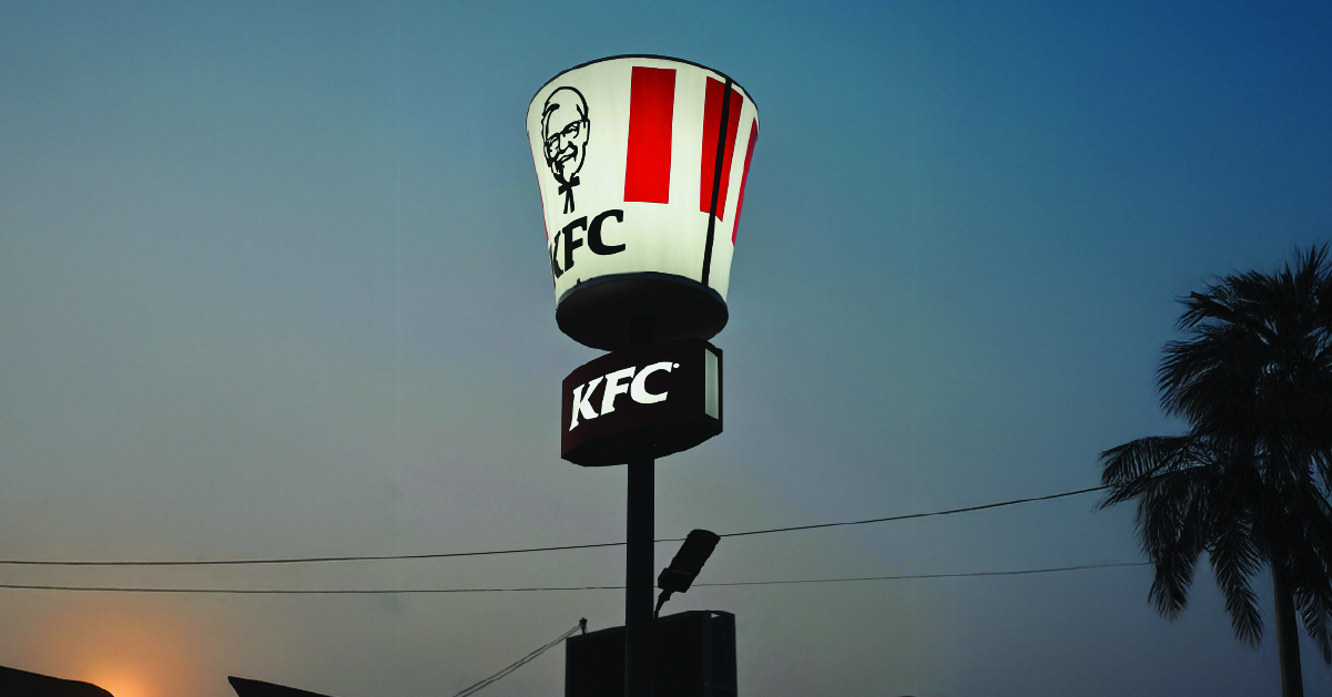 A giant KFC bucket on a KFC sign