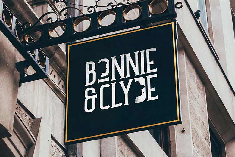 Image shows the branding for Bonnie & Clyde on a hanging sign