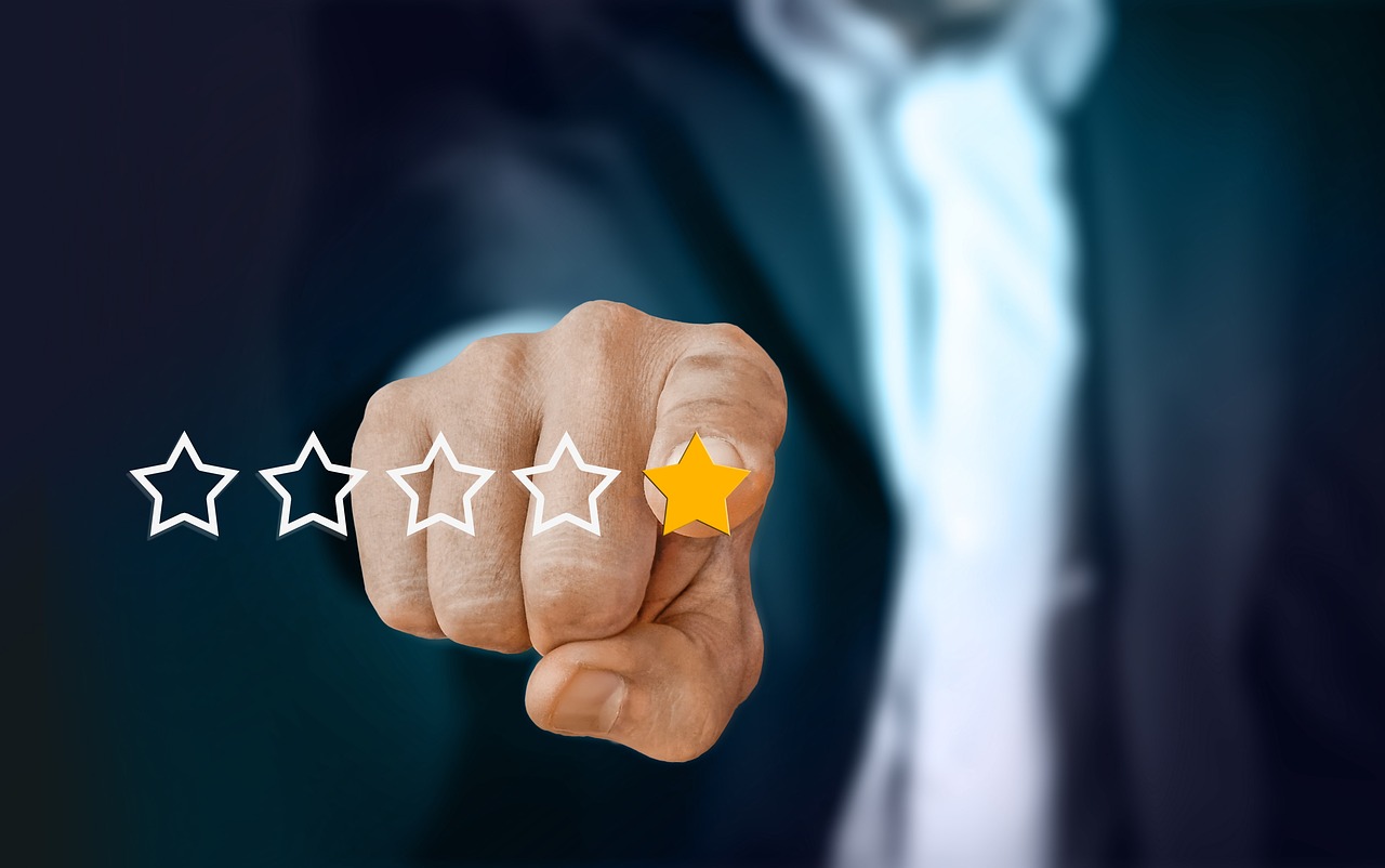 Hand selecting a five star review