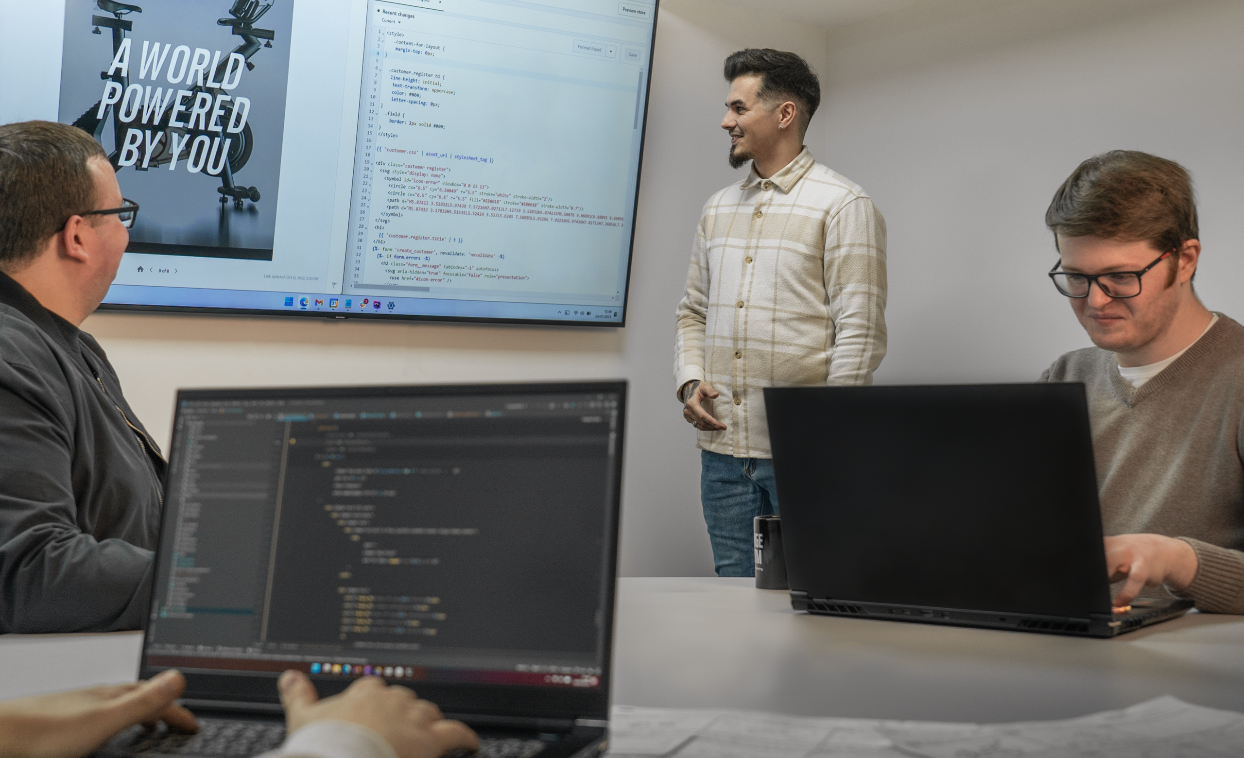 Create8 web design team working on a Shopify website