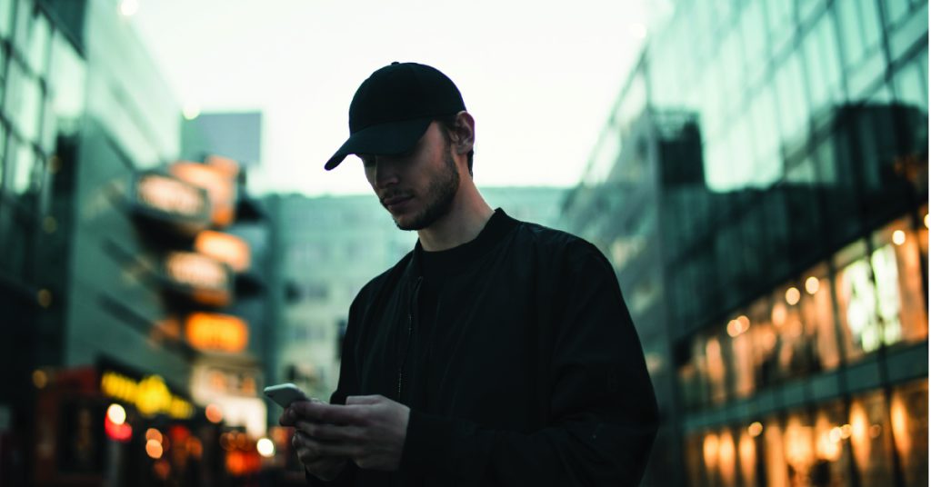 Man shopping on his phone