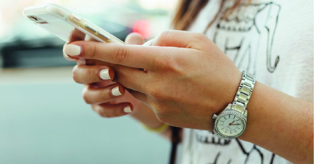 Woman using ChatGPT to browse products on her phone