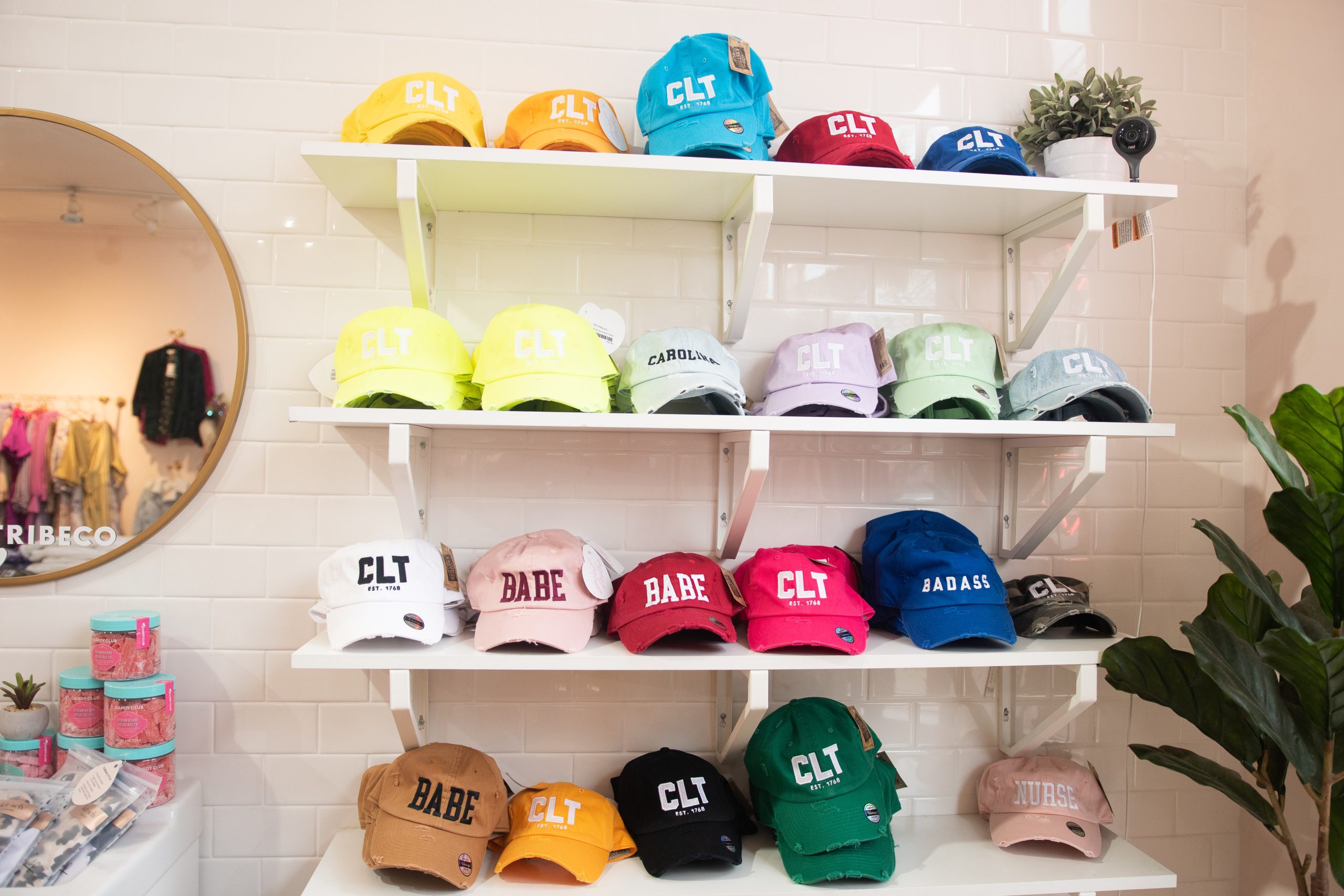 Hats on a shelf in different colours and product variations