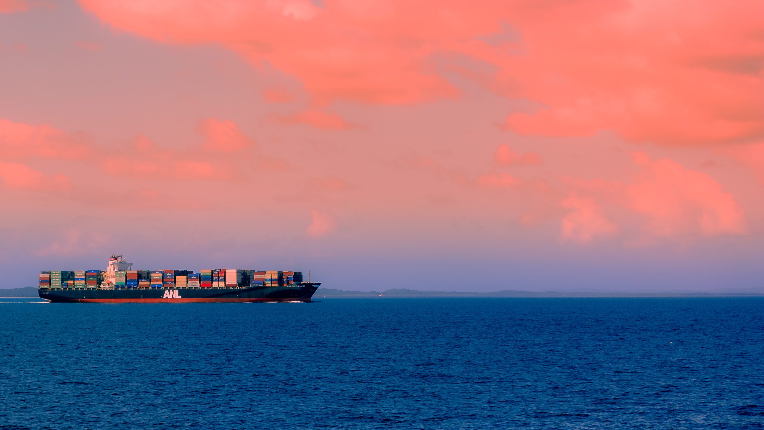 International shipping handler carrying freight across the ocean on a large ship