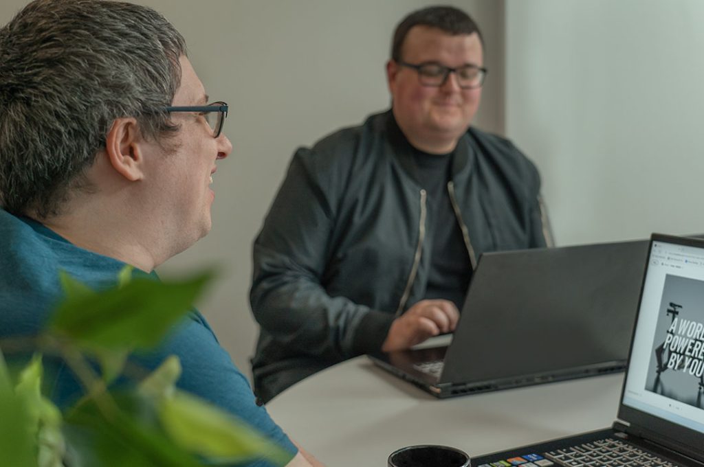 Keaton and Mike discussing backend project