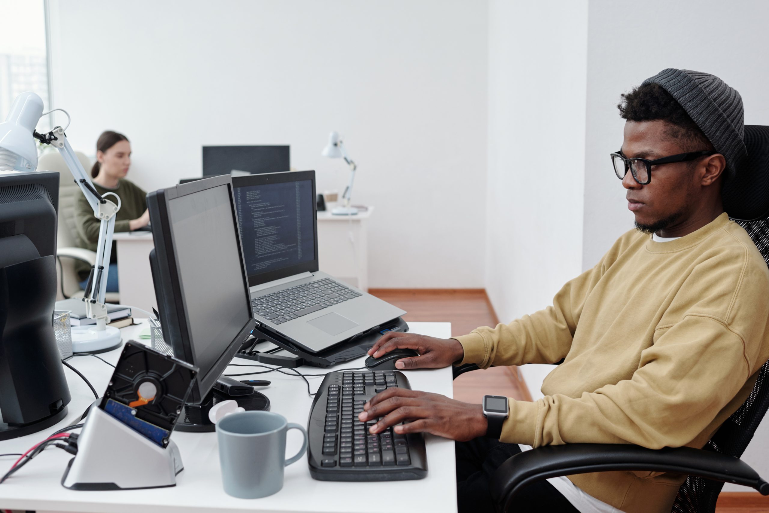 WordPress developer working at a desk in an agency