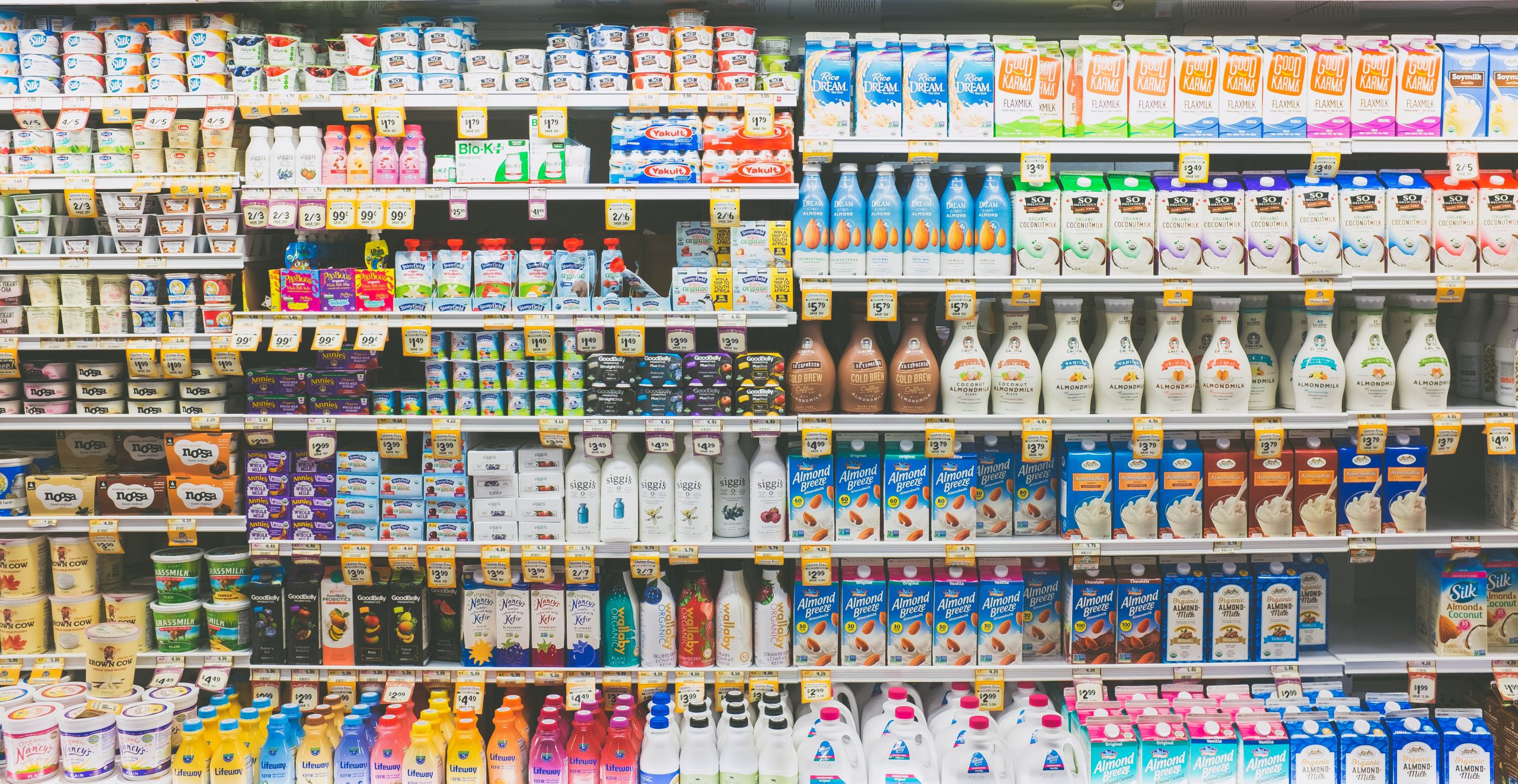 Supermarket shelves filled with lots of colourful products