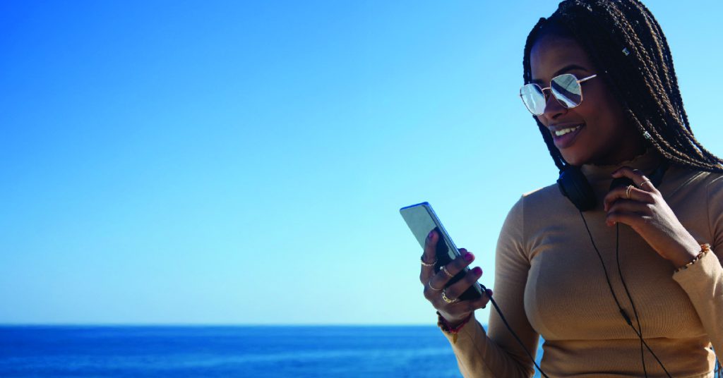 Customer checking social media post on her phone
