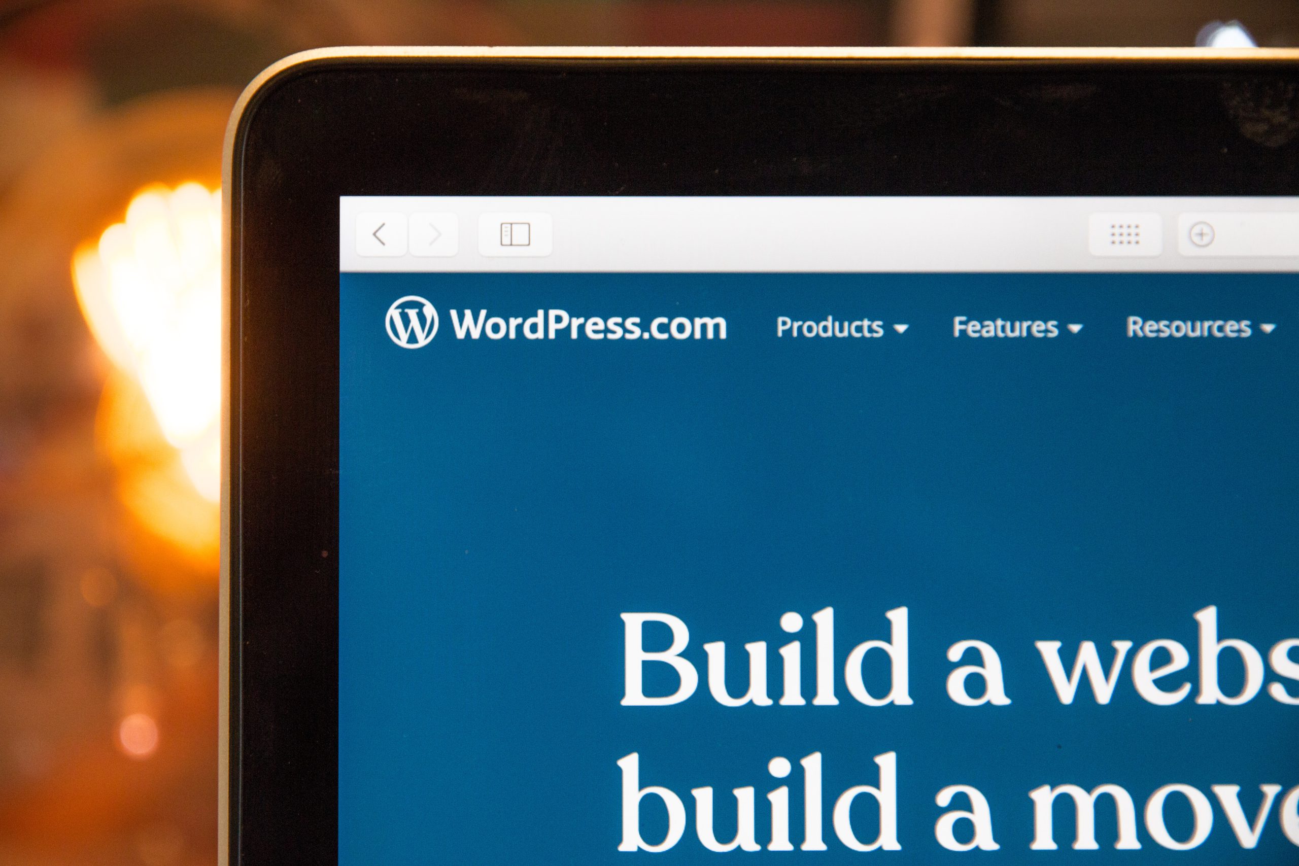 WordPress website builder shown on a laptop screen