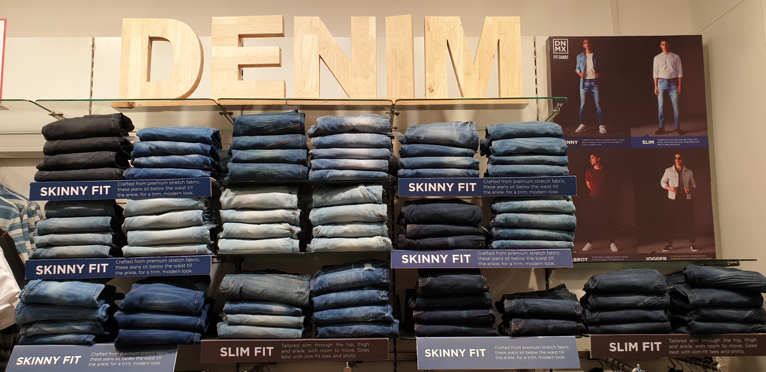Denim jeans ecommerce stock folded on a shelf